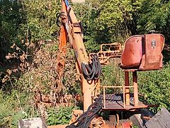 Atlas Bagger mit Werkzeugen